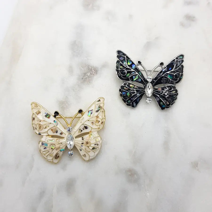 BLK ENAMEL LOOK WITH COLORED SPECS BUTTERFLY BROOCH