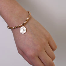 4MM STRETCHY BRACELET WITH ROUND ST CHRISTOPHER